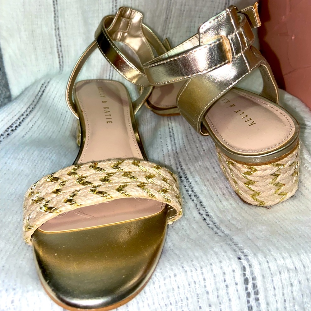 Never worn sandals with small heel
